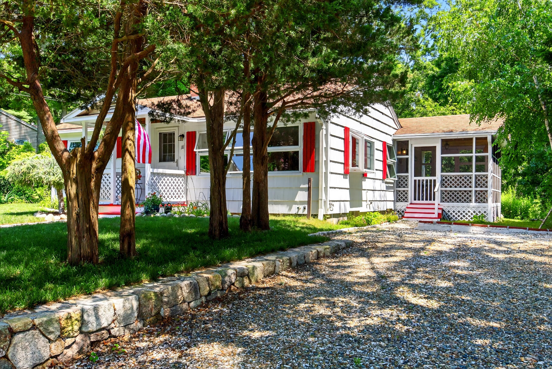 18 Seaview Road Sagamore Beach, MA 02562 - Photo 48 of 62 a front view of a house with garden