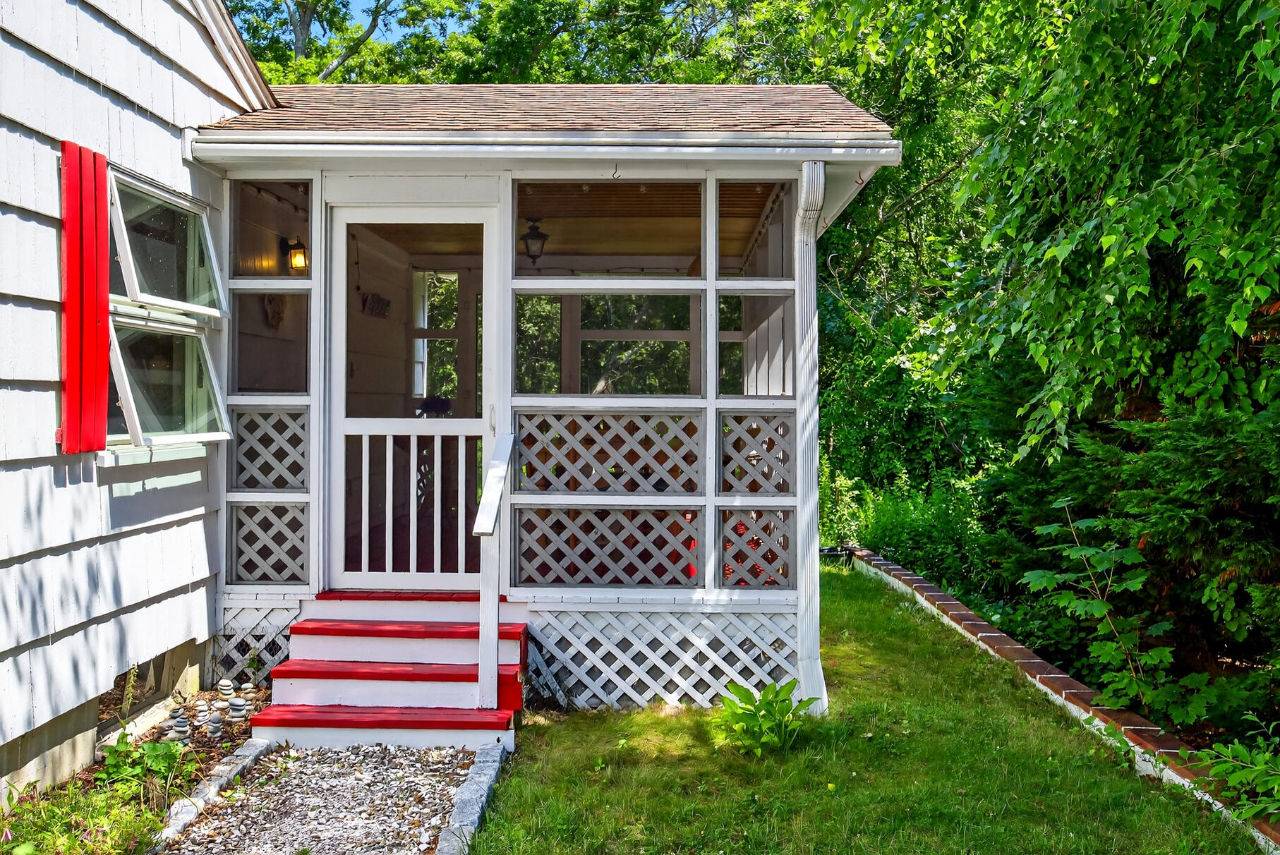 18 Seaview Road Sagamore Beach, MA 02562 - Photo 49 of 62 a front view of a house with a large window