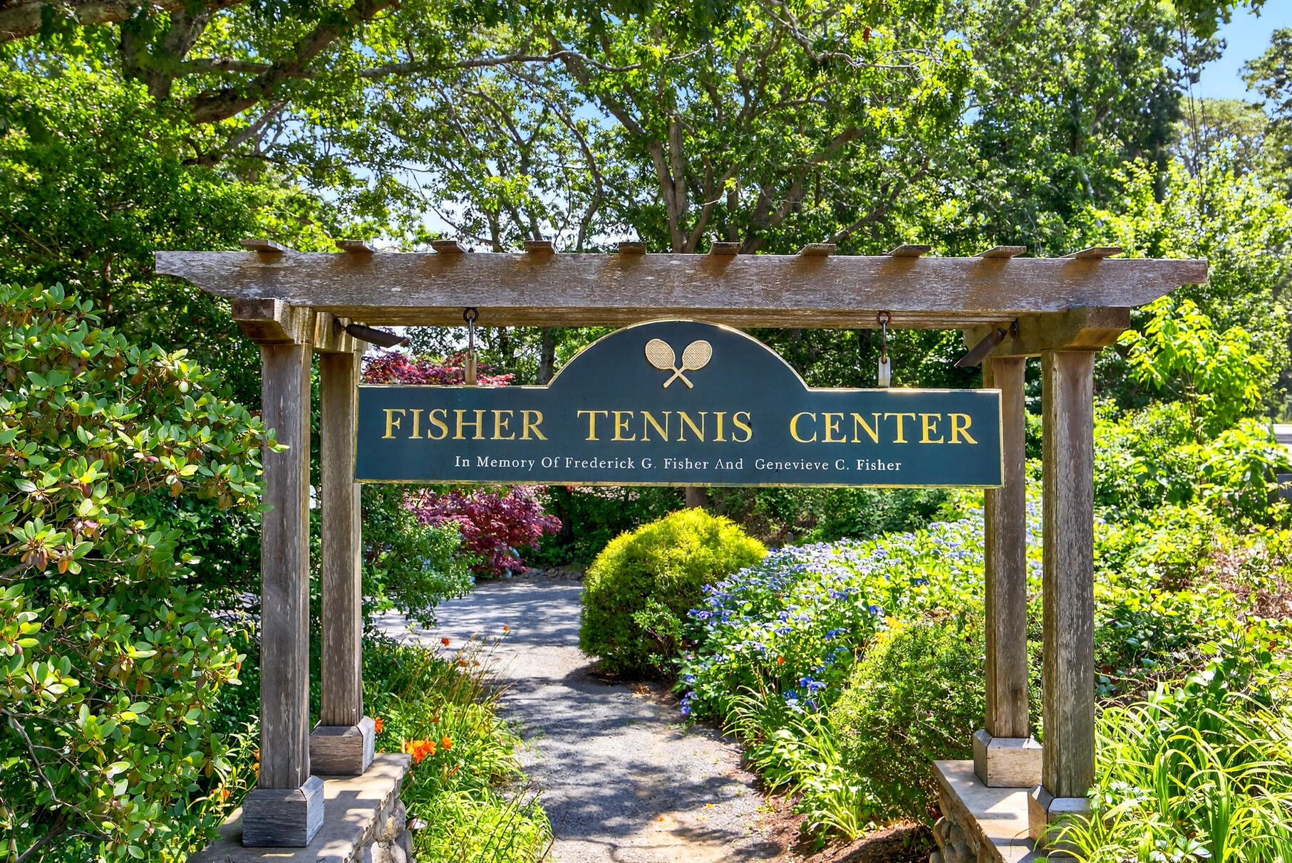 18 Seaview Road Sagamore Beach, MA 02562 - Photo 55 of 62 a view of a street sign under a large tree