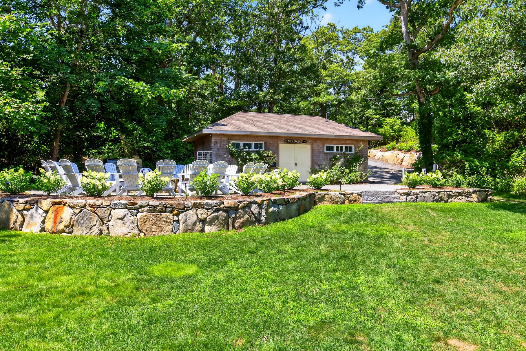 18 Seaview Road Sagamore Beach, MA 02562 - Photo 60 of 62 a view of a house with a yard porch and sitting area