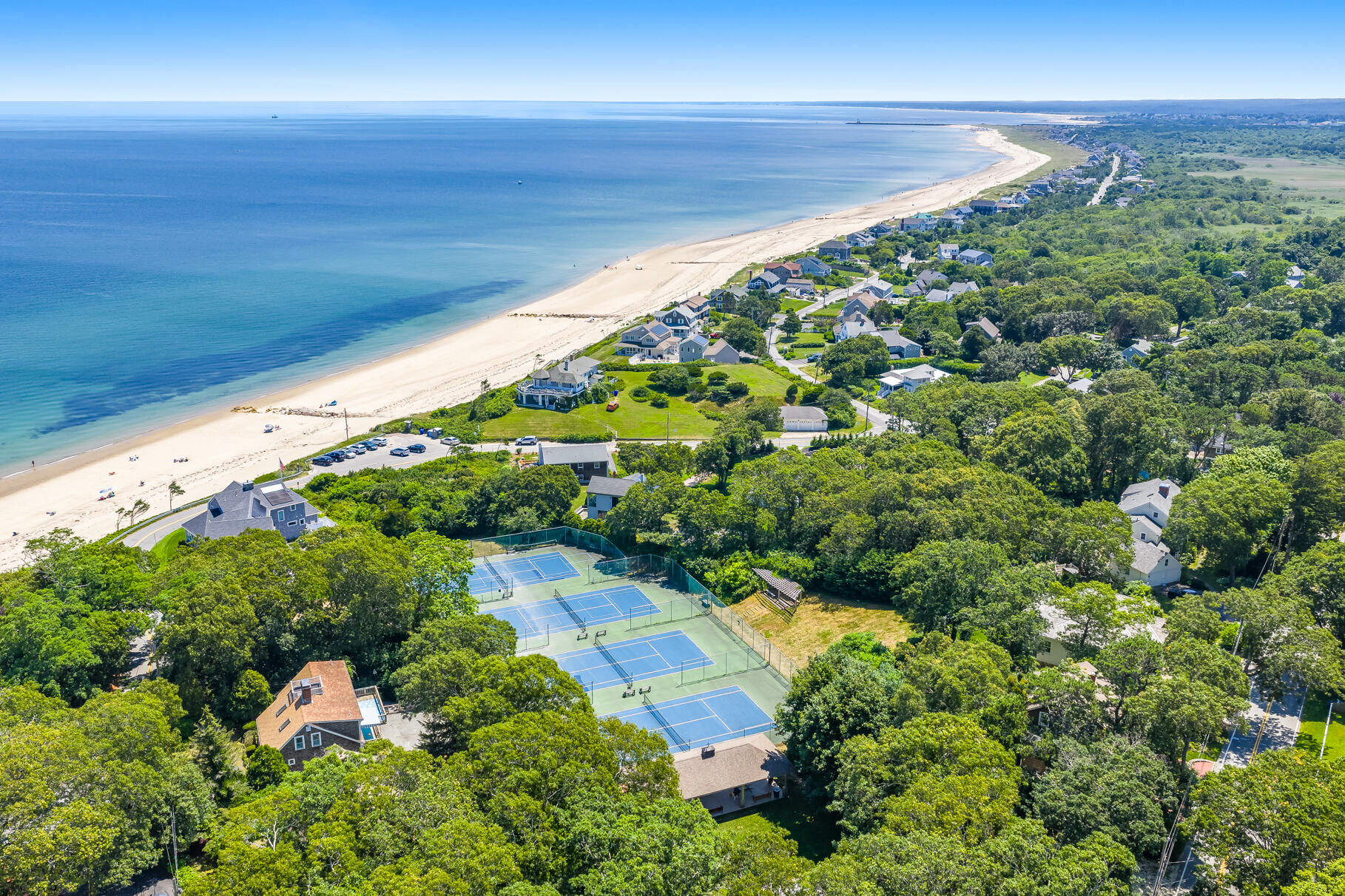 18 Seaview Road Sagamore Beach, MA 02562 - Photo 8 of 62 a backyard of a house with lots of green space