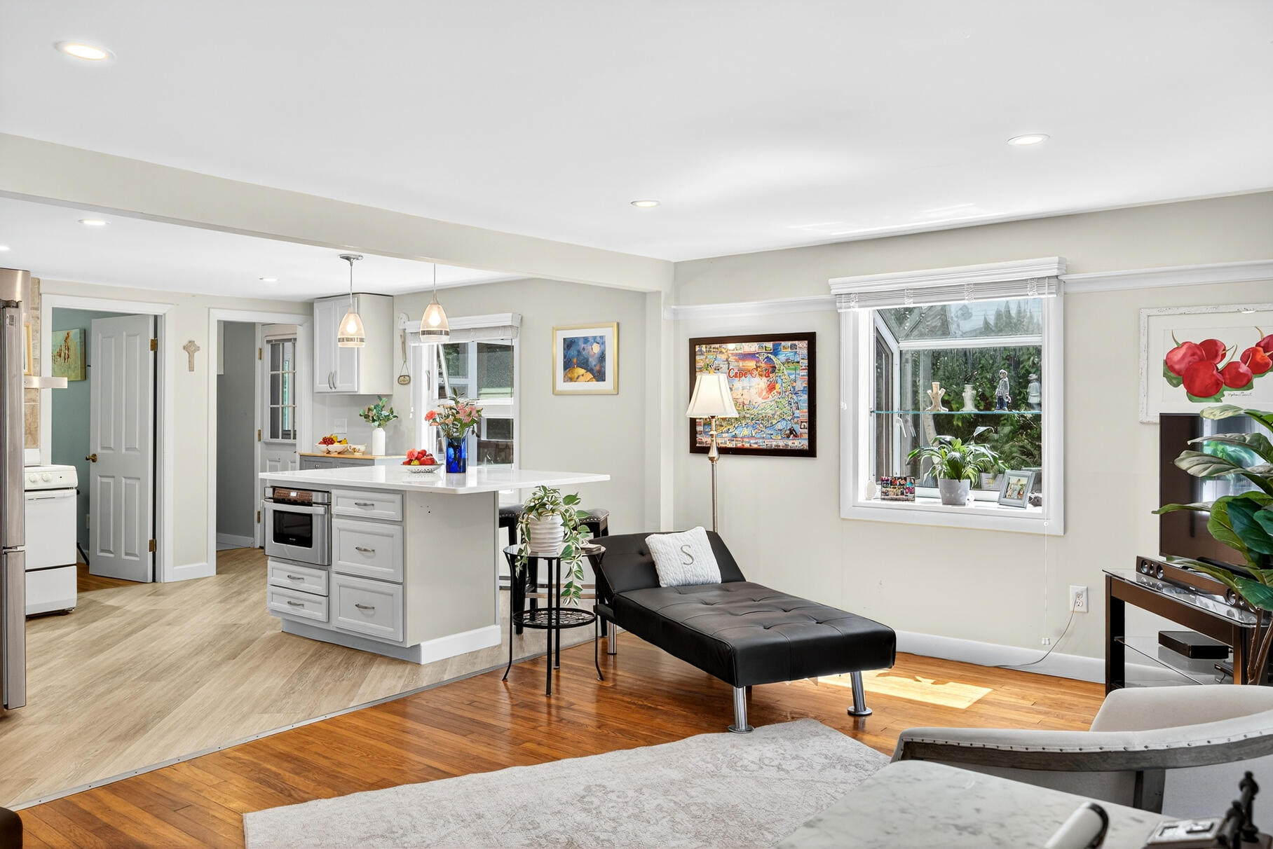 18 Seaview Road Sagamore Beach, MA 02562 - Photo 10 of 62 a living room with furniture and a potted plant