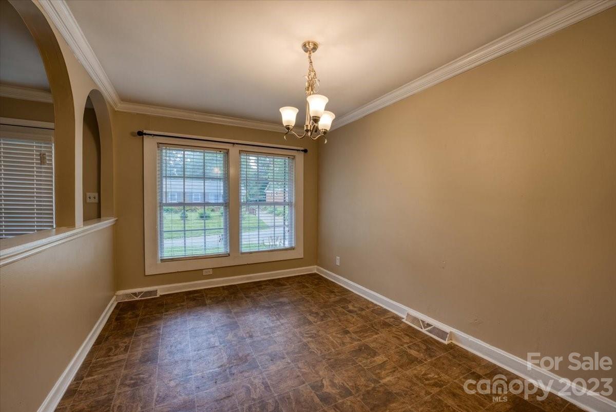 1223 Ranch Road Charlotte, NC 28208 - Photo 4 of 34 an empty room with a windows