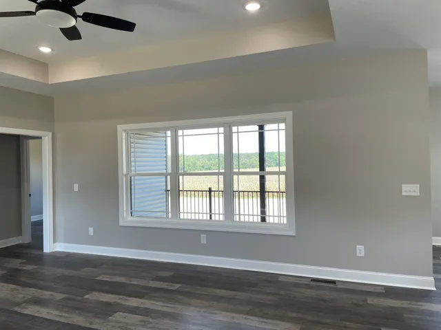 a bathroom with double sink and a mirror