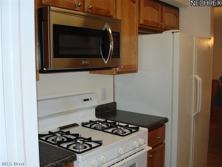 1784 Sunview Road Cleveland, OH 44124 - Photo 4 of 20 Close up of new microwave and Kraftmaid cabinets, new counters, just beautiful remodel!