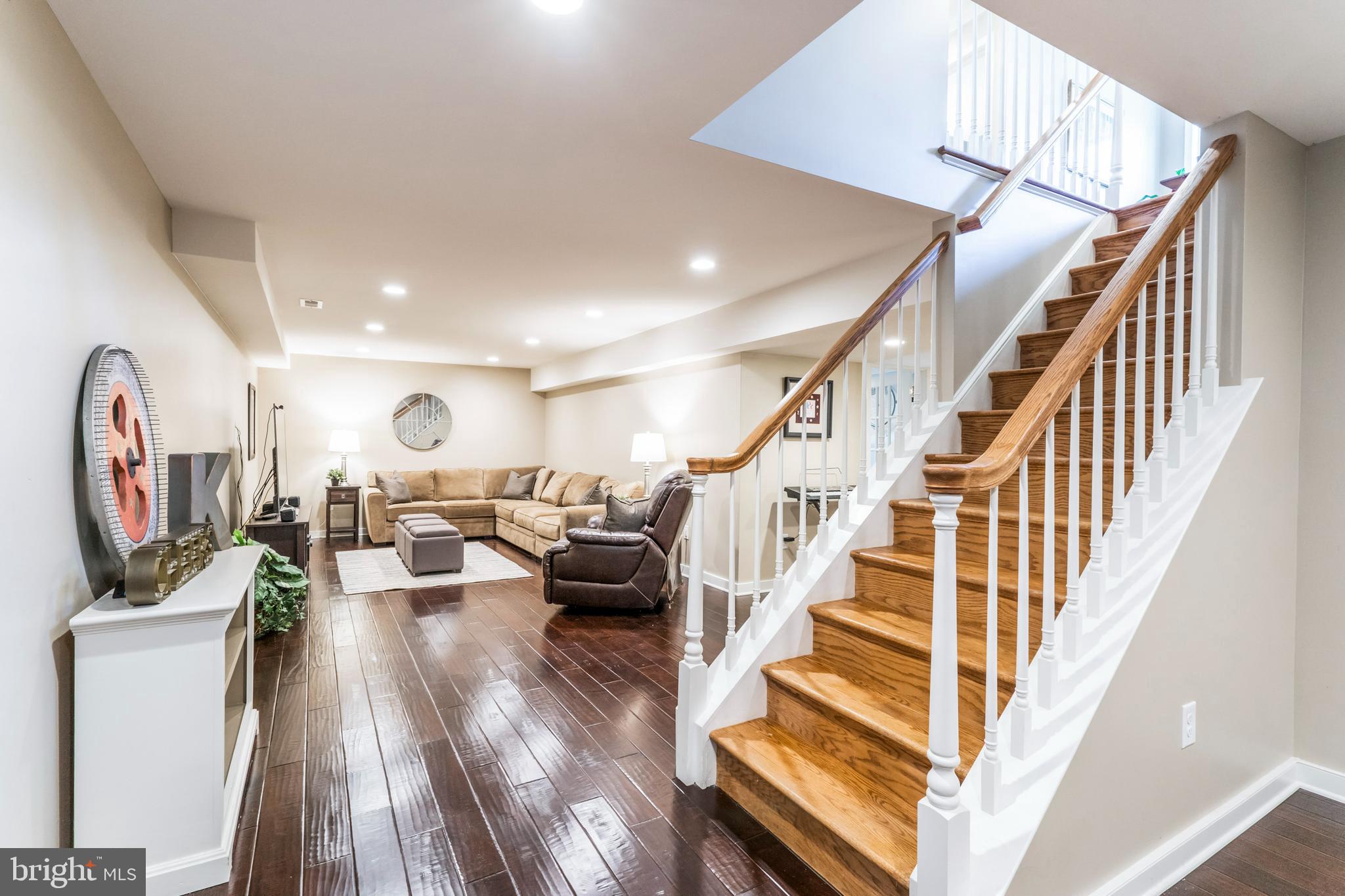 1044 Jonathan Drive Malvern, PA 19355 - Photo 28 of 42 Finished basement suite with oak stairs