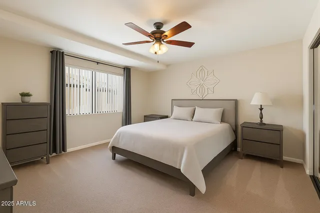 a kitchen with granite countertop a refrigerator stove and microwave