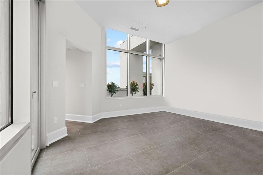 2828 Peachtree Road Northwest, Unit P 3300 Atlanta, GA 30305 - Photo 39 of 62 an empty room with windows