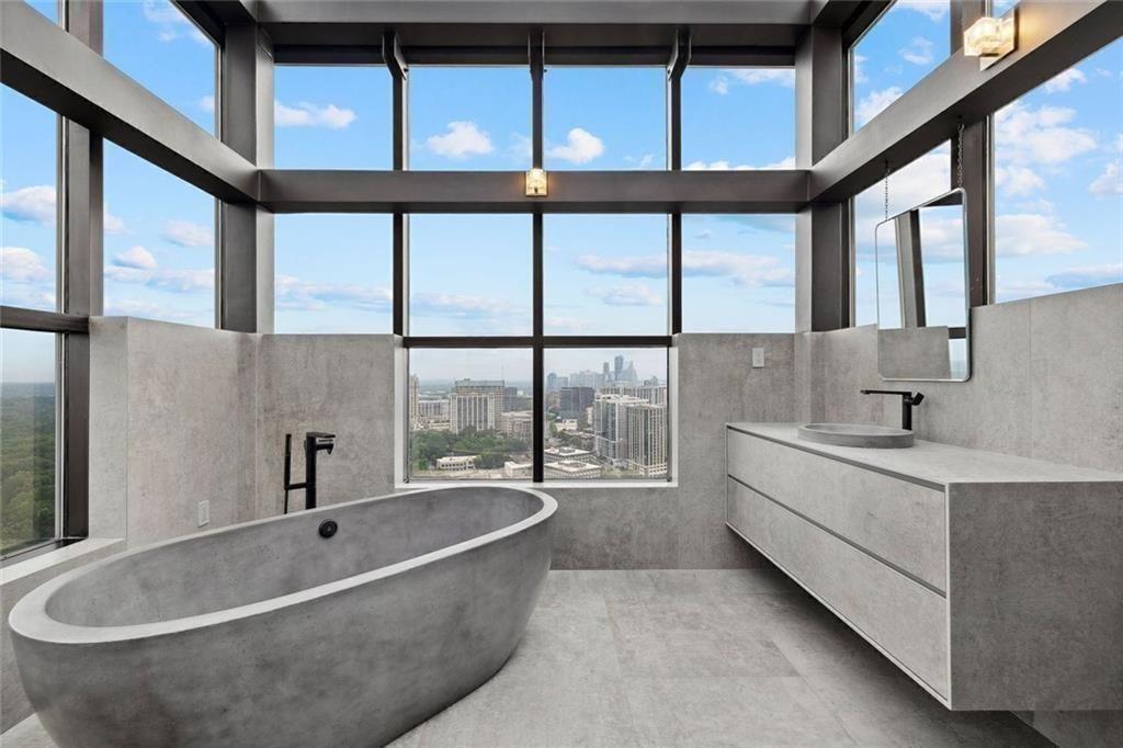 2828 Peachtree Road Northwest, Unit P 3300 Atlanta, GA 30305 - Photo 46 of 62 a bathroom with a bathtub and a sink
