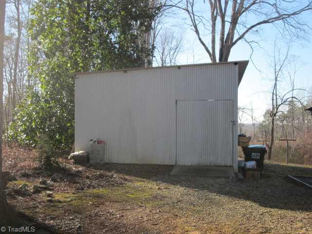 186 Greenhill Road Ramseur, NC 27316 - Photo 4 of 13 Outbuilding. 33x18 storage building