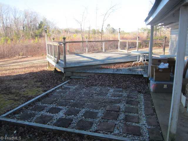 186 Greenhill Road Ramseur, NC 27316 - Photo 5 of 13 Exterior Back. back patio and 20x16 deck