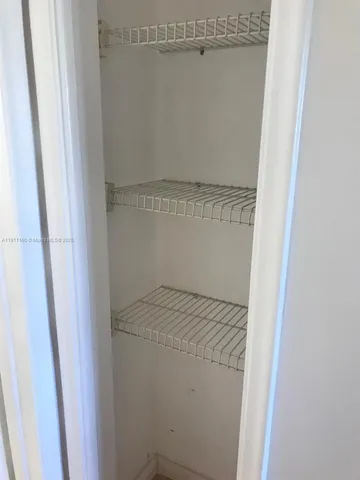 a white toilet and a bath tub