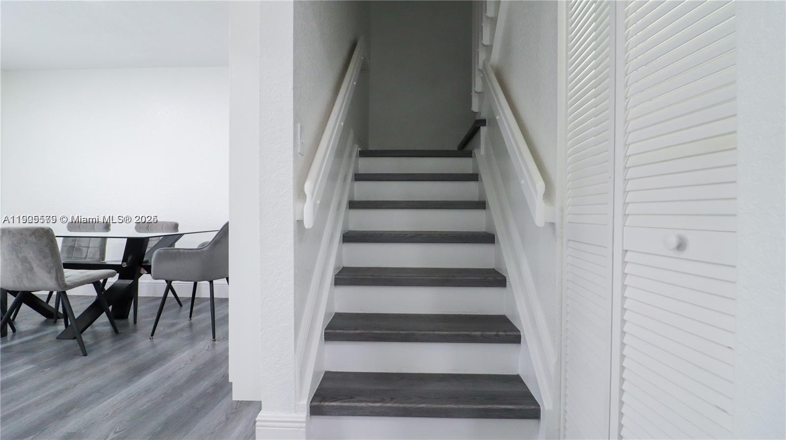 15330 Southwest 134th Place, Unit 308 Miami, FL 33177 - Photo 21 of 29 a view of entryway and hall with wooden floor