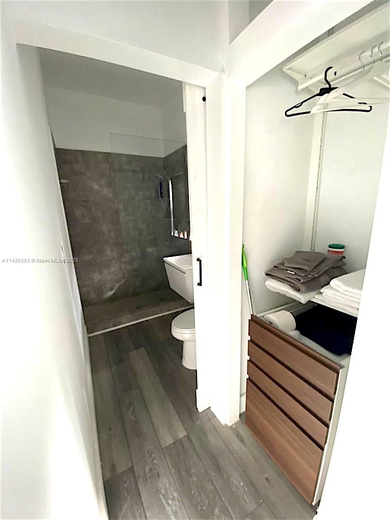 120 Southwest 26th Road Miami, FL 33129 - Photo 54 of 55 a bathroom with a sink and a mirror