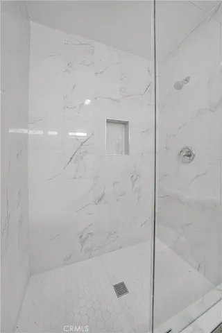 a view of a kitchen with wooden floor