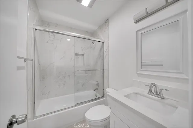 a view of a balcony with wooden floor