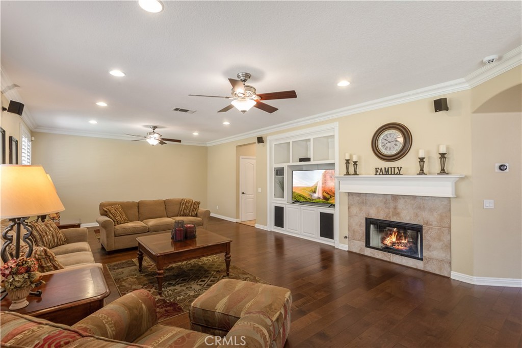 33351 Nicholas Common Temecula, CA 92592 - Photo 15 of 42 a living room with furniture and a fireplace