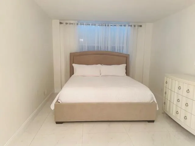 a bathroom with a shower and a bathtub