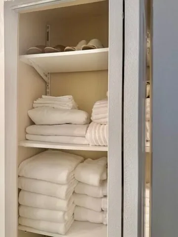 a kitchen with a sink and a stove top oven