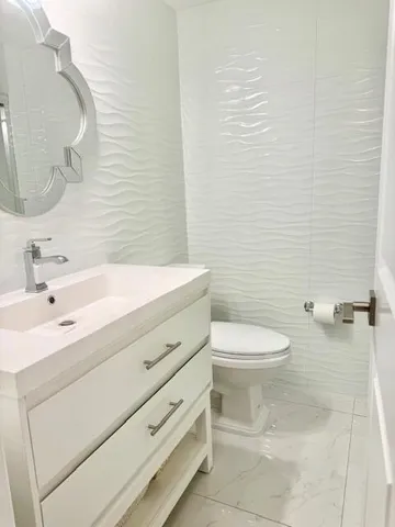 a view of a yard with cars