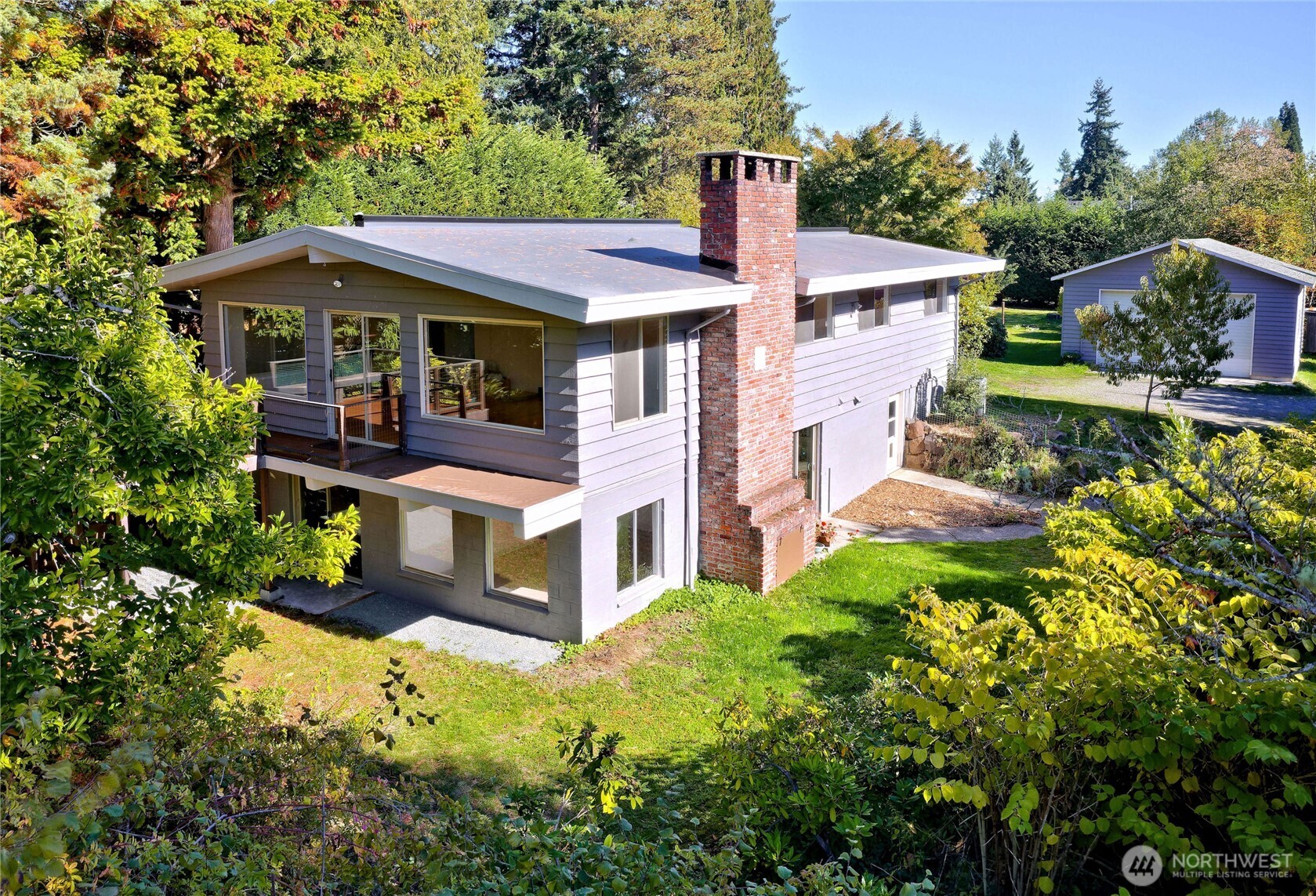 front view of a house with a small yard