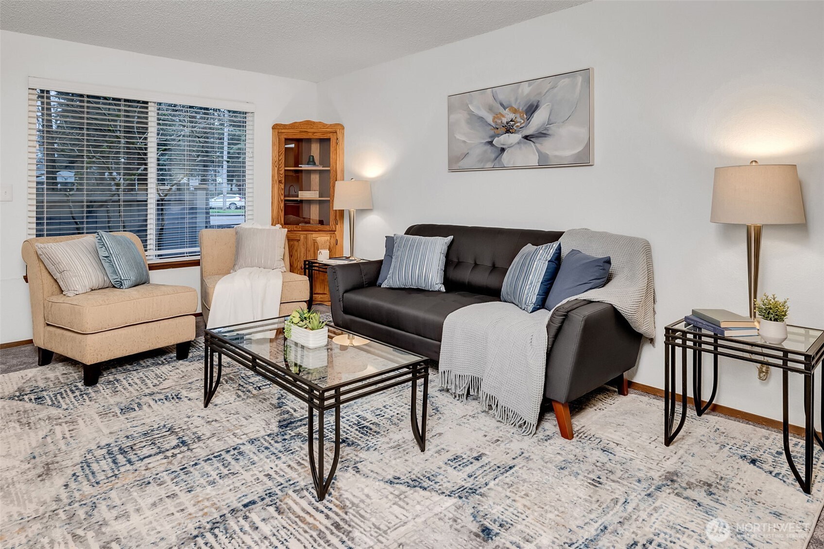 7520 208th Street Southwest, Unit A101 Edmonds, WA 98026 - Photo 7 of 27 a living room with furniture and a window