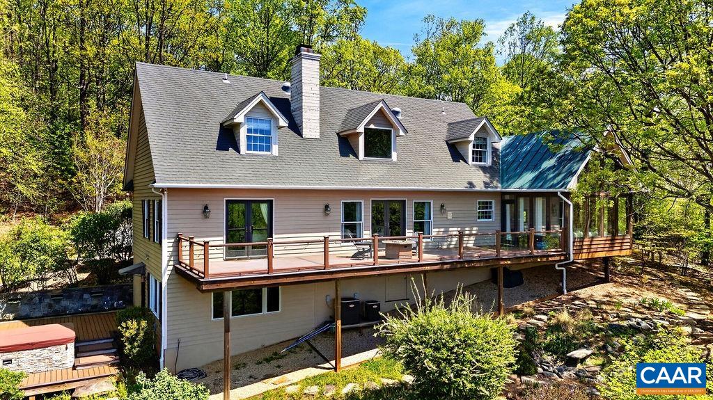 1059 Bryant Mountain Road Roseland, VA 22967 - Photo 39 of 58 a aerial view of a house with swimming pool and sitting area