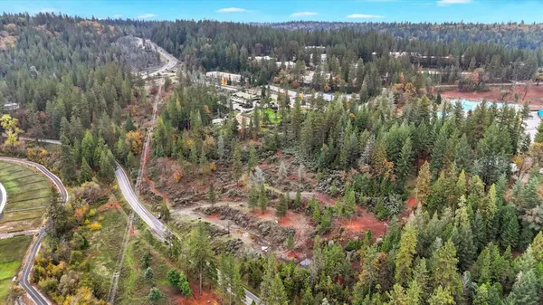 a view of a lake with a big yard