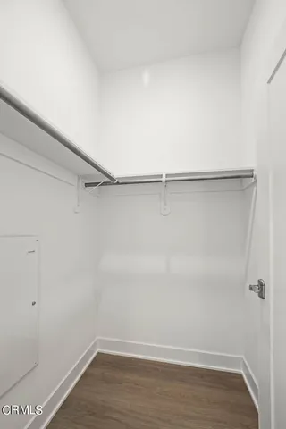 a view of an empty walk in closet