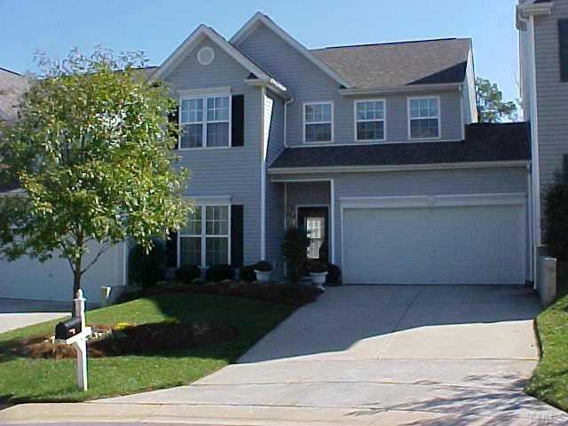 1140 Garnet Ridge Way Raleigh, NC 27607 - Photo 1 of 1 a front view of a house with garden