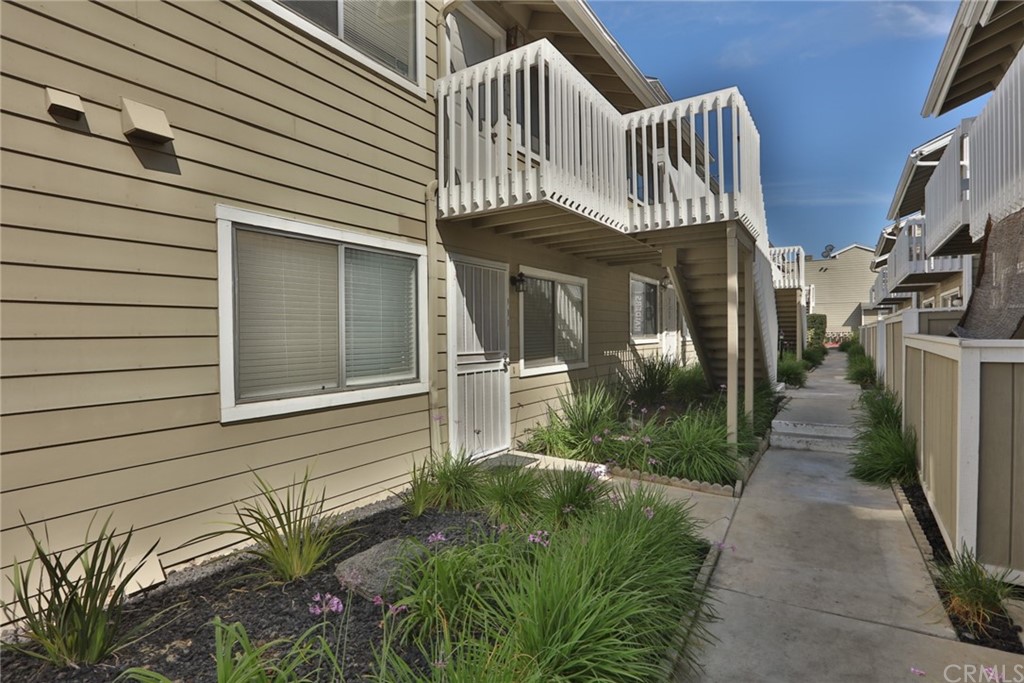 10700 Colima Road, Unit 909 Whittier, CA 90604 - Photo 1 of 1 a view of a house with a yard