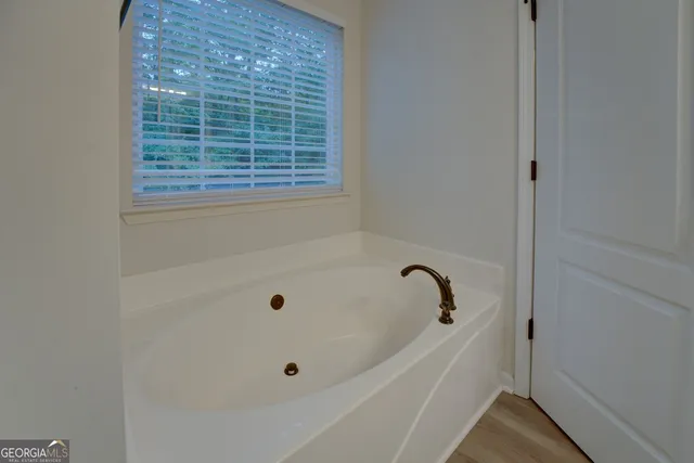 a bathroom with a bathtub