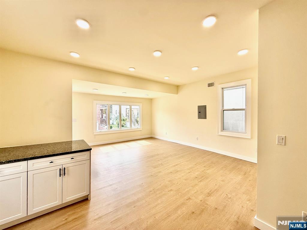 144 Centre Avenue Secaucus, NJ 07094 - Photo 11 of 22 a view of an empty room and window