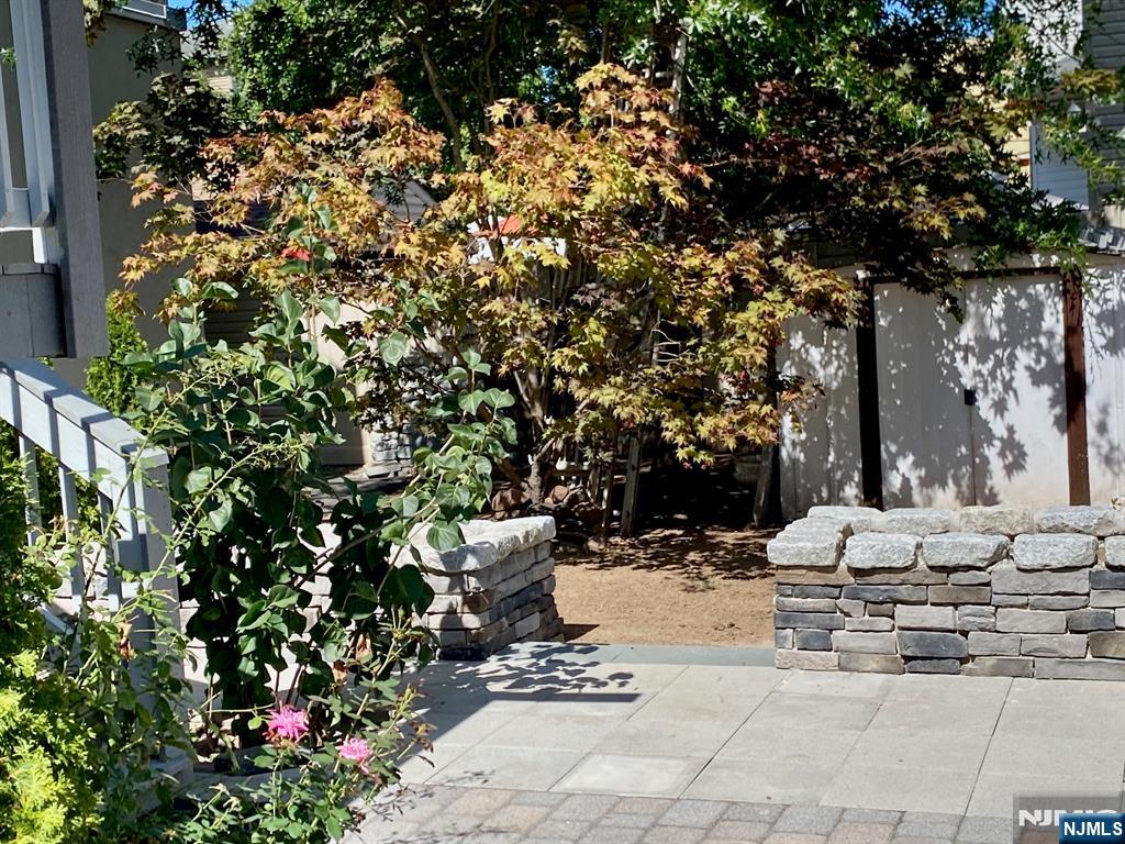 144 Centre Avenue Secaucus, NJ 07094 - Photo 17 of 22 a outdoor space with lots of green space