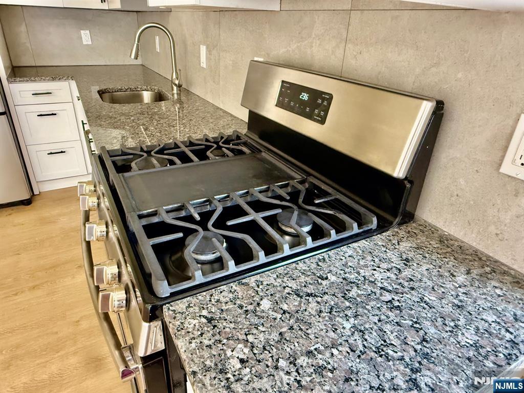 144 Centre Avenue Secaucus, NJ 07094 - Photo 2 of 22 a close view of a stove top oven