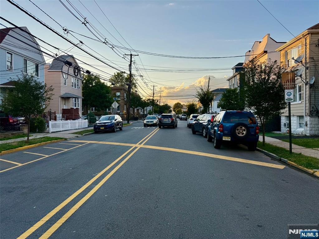 144 Centre Avenue Secaucus, NJ 07094 - Photo 21 of 22 a view of a city street with a parked car
