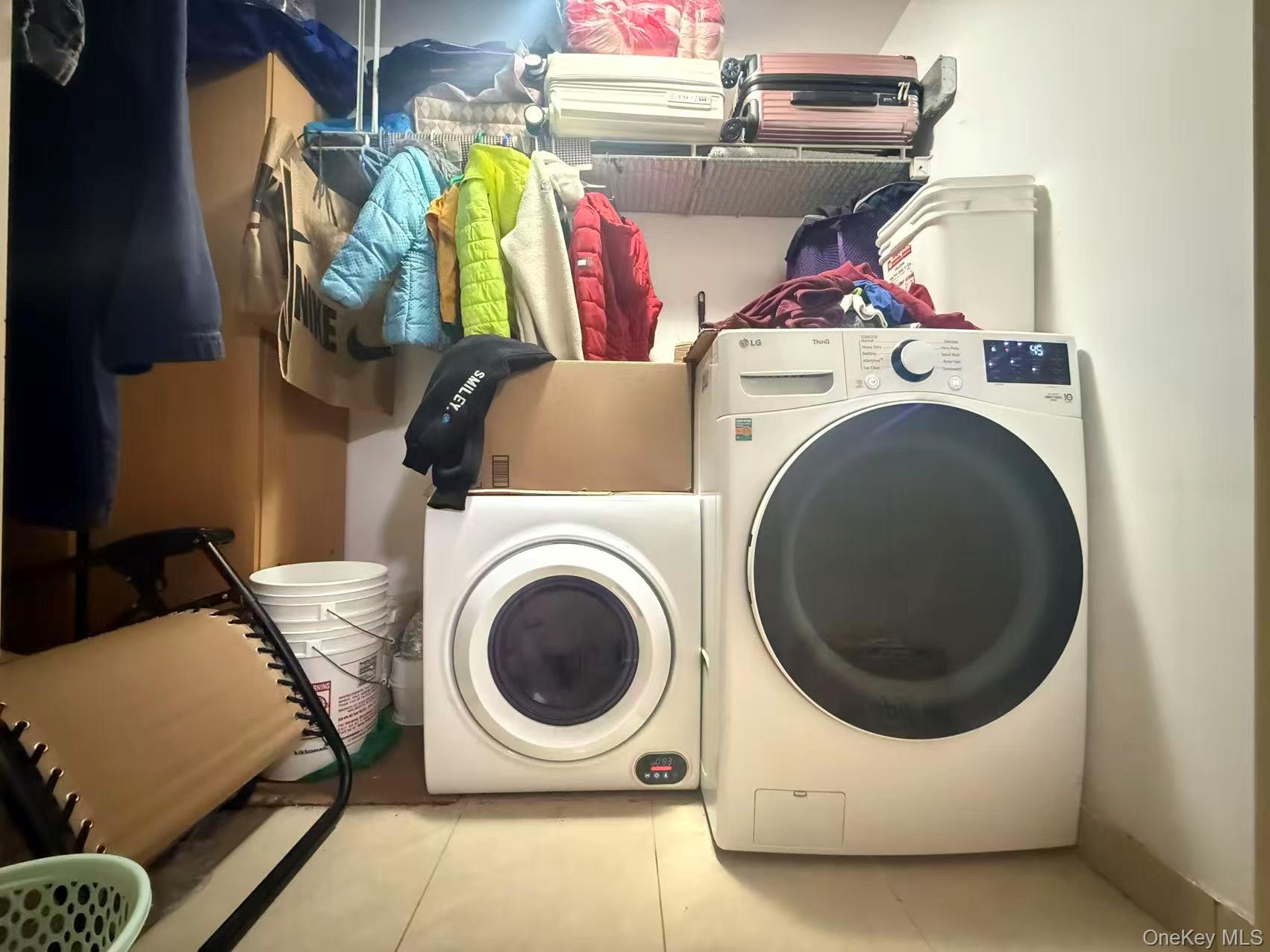 43-17 Union Street, Unit 6E Queens, NY 11355 - Photo 6 of 7 a utility room with dryer and washer