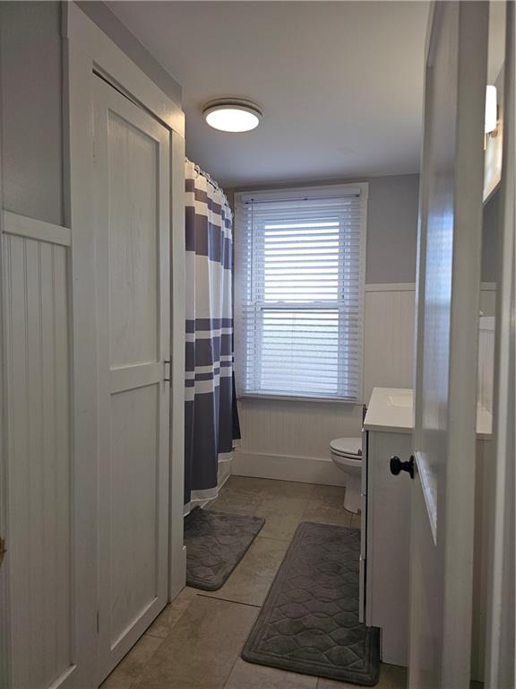 952 Roup Avenue Brackenridge, PA 15014 - Photo 13 of 25 a bathroom with a shower and a sink