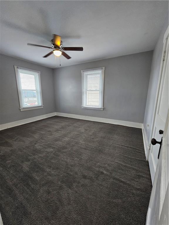 952 Roup Avenue Brackenridge, PA 15014 - Photo 15 of 25 an empty room with windows and fan