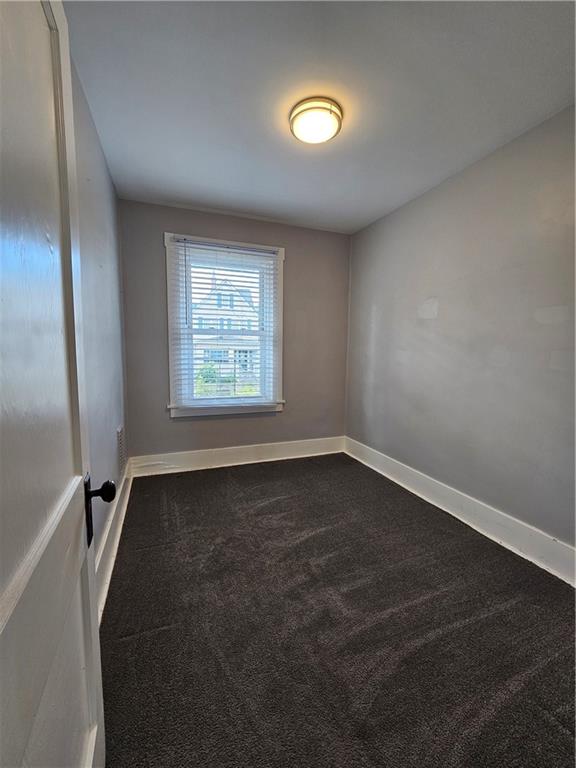 952 Roup Avenue Brackenridge, PA 15014 - Photo 17 of 25 an empty room with a window