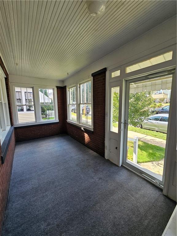 952 Roup Avenue Brackenridge, PA 15014 - Photo 2 of 25 a view of an empty room with large windows
