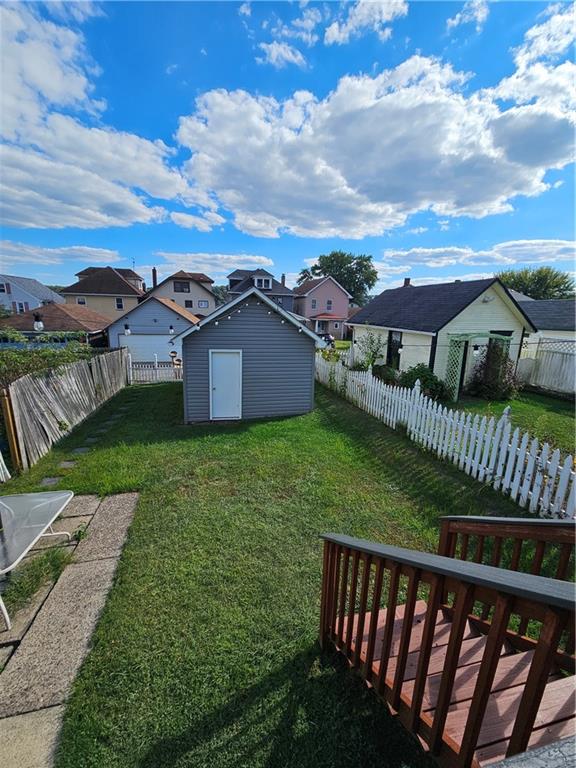 952 Roup Avenue Brackenridge, PA 15014 - Photo 22 of 25 a view of a house with backyard and porch