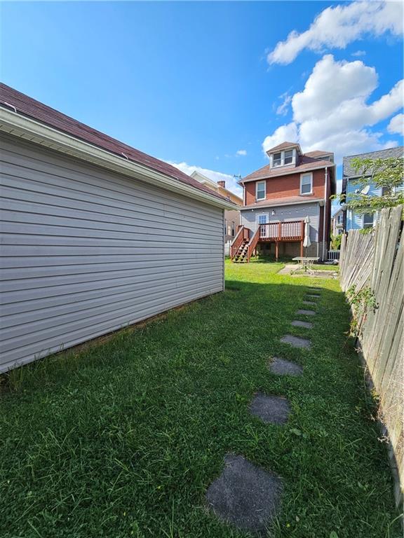 952 Roup Avenue Brackenridge, PA 15014 - Photo 23 of 25 a view of a backyard with plants and a patio