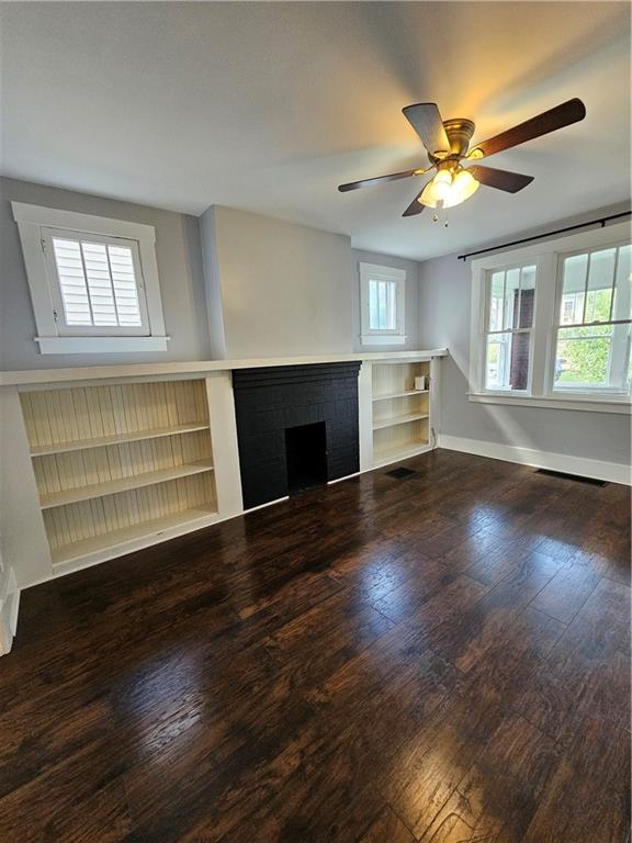 952 Roup Avenue Brackenridge, PA 15014 - Photo 4 of 25 a view of empty room with wooden floor and fan