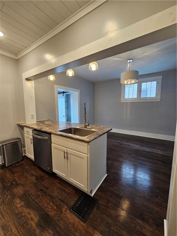 952 Roup Avenue Brackenridge, PA 15014 - Photo 8 of 25 a kitchen with stainless steel appliances granite countertop a stove a sink and a refrigerator