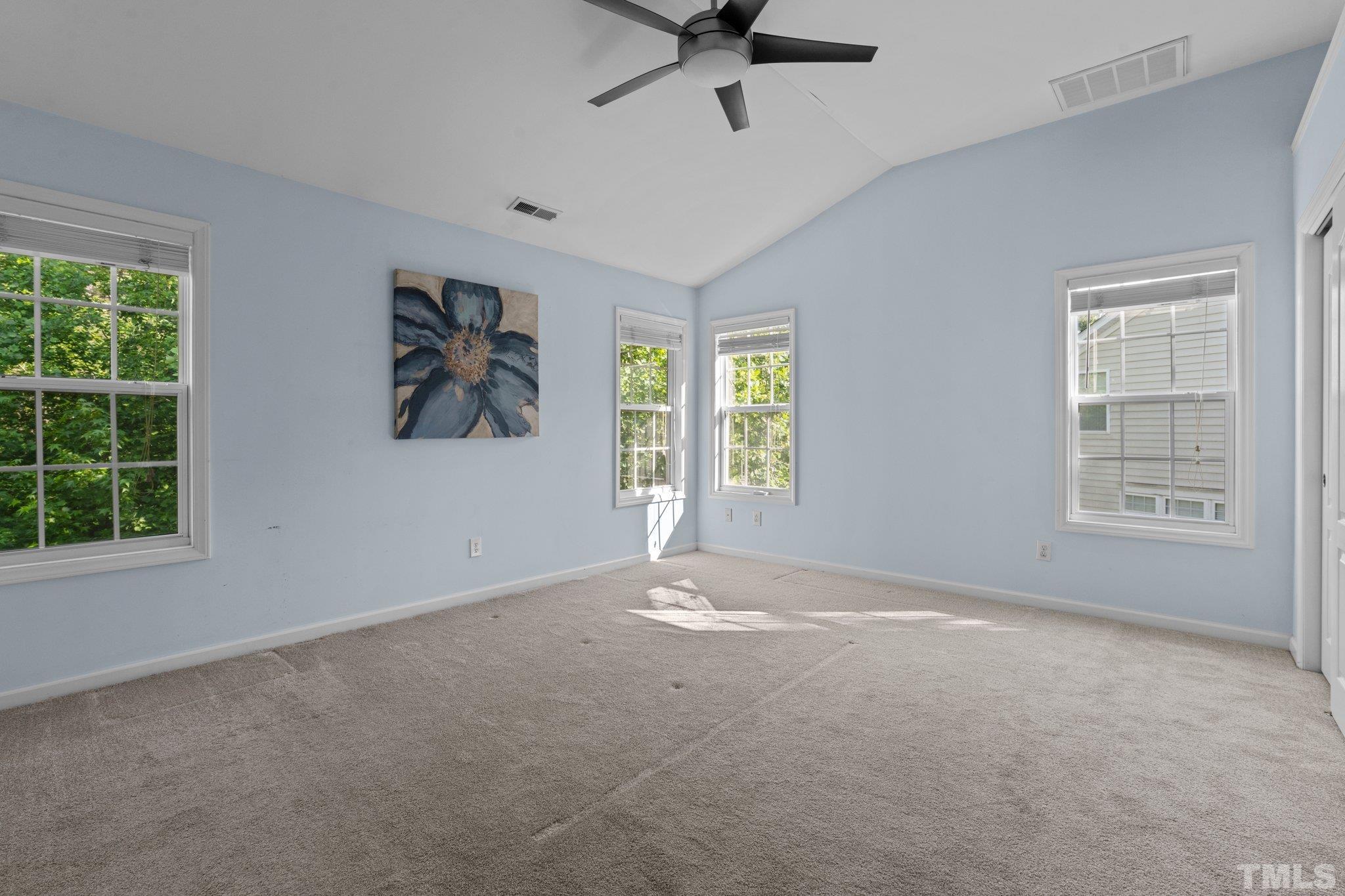 6831 Middleboro Drive Raleigh, NC 27612 - Photo 14 of 32 an empty room with windows and closet