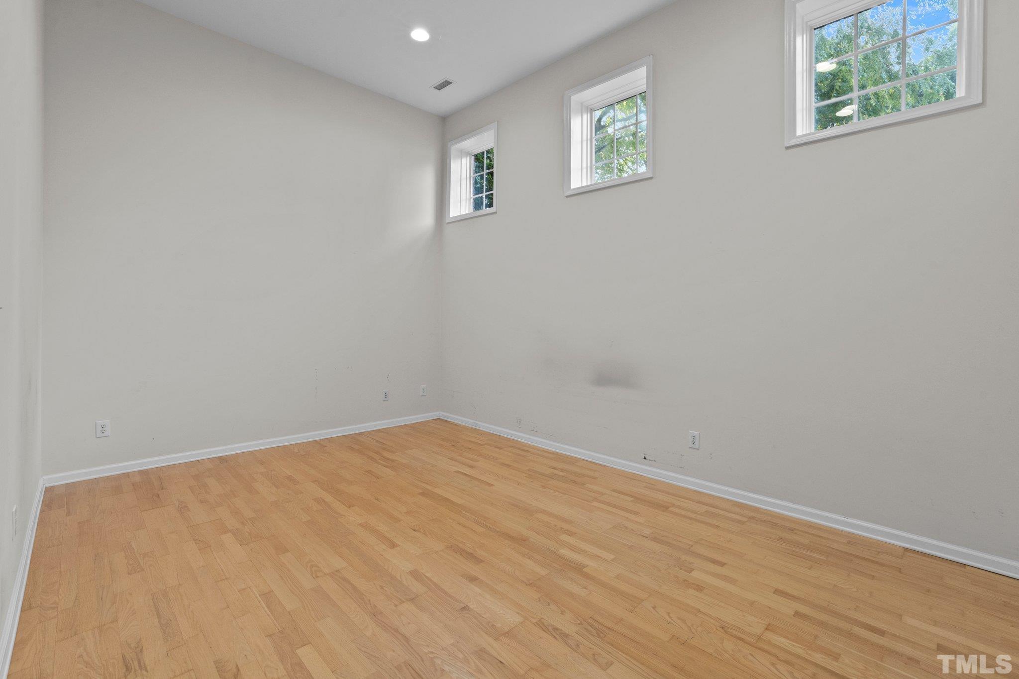 6831 Middleboro Drive Raleigh, NC 27612 - Photo 26 of 32 a view of an empty room with a window