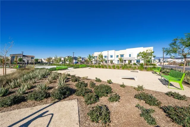a view of a backyard with sitting area