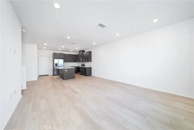 a view of kitchen and kitchen island