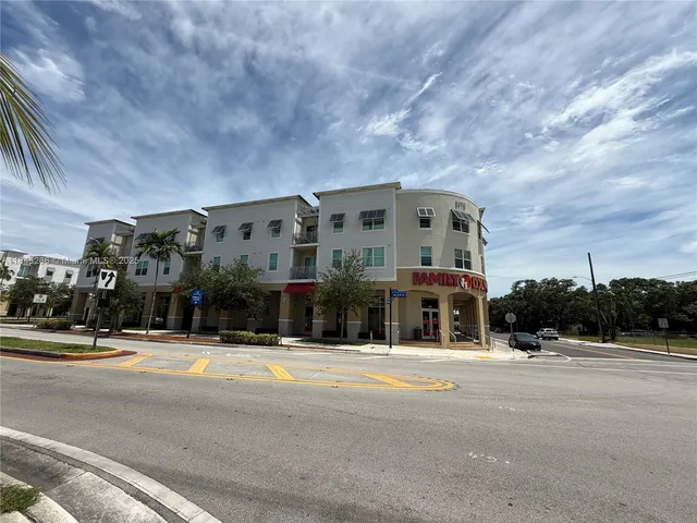 a view of a building with a street
